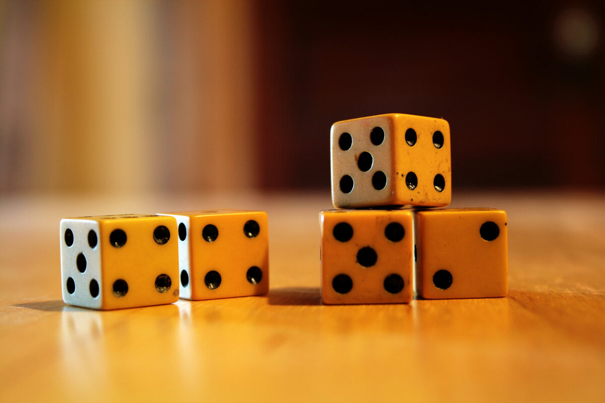 Five ivory dice