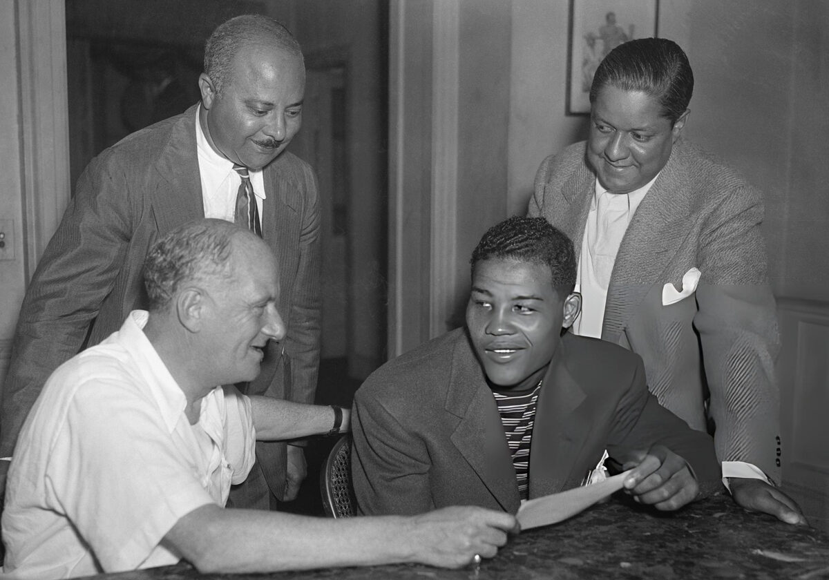 Joe Louis receiving $114,332 for the fight against Galento