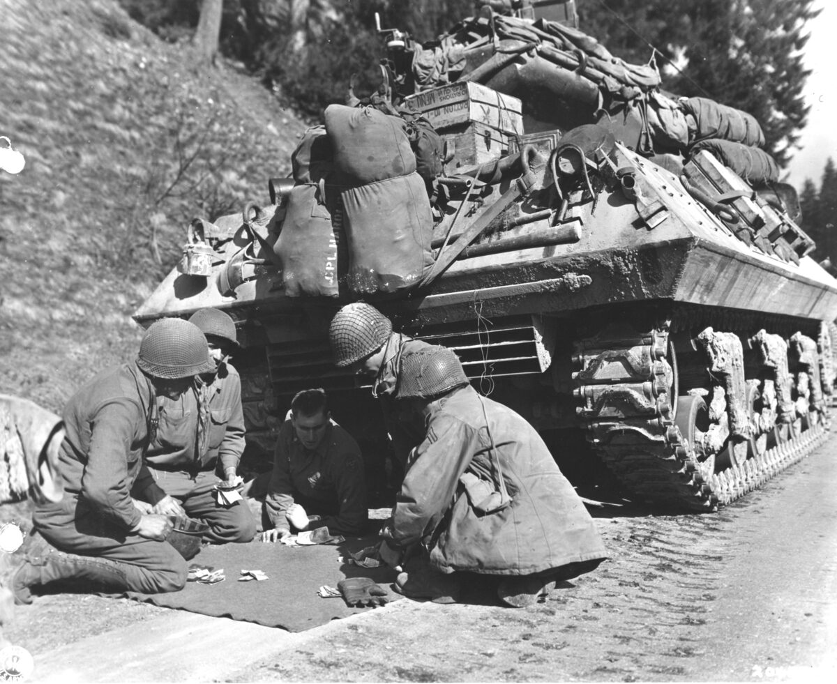 крэпс — Photograph of a Tank Destroyer Crew Playing Craps While Awaiting Removal of a Ro