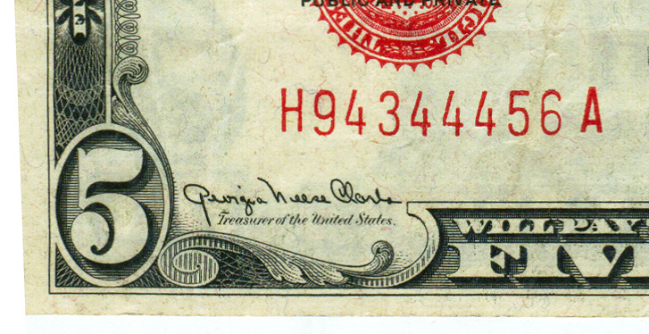 Serial number on five dollar bill